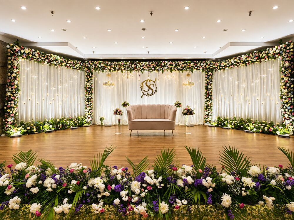 Reception stage, wide, before the guests arrive.